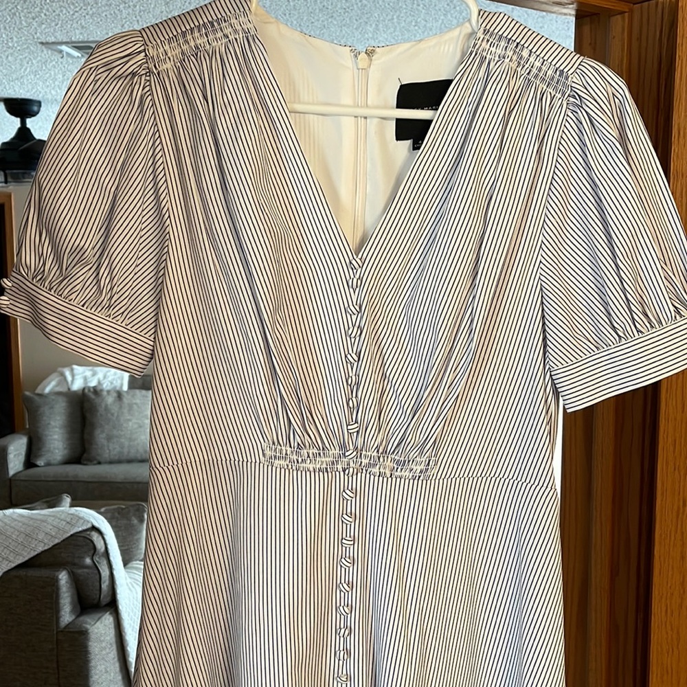 Quality Alex, Marie, dress that hits mid calf, has nice waist line